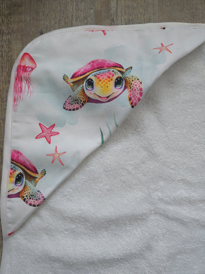 Cape de bain tortue rose My Baby Avenue